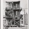 Back of multi-family dwellings rented to Negroes. Chicago, Illinois