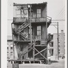 Back of multi-family dwellings rented to Negroes. Chicago, Illinois