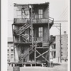 Back of multi-family dwellings rented to Negroes. Chicago, Illinois