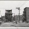 Children playing in vacant lot in Negro section of Chicago, Illinois