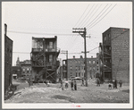 Children playing in vacant lot in Negro section of Chicago, Illinois