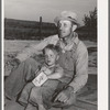 Mr. Schroeder and his son. He is a FSA (Farm Security Administration) rehabilitation borrower. Dead Ox Flat, Malheur County, Oregon