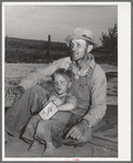 Mr. Schroeder and his son. He is a FSA (Farm Security Administration) rehabilitation borrower. Dead Ox Flat, Malheur County, Oregon