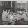 The Ray Halstead family eating dinner. They are FSA (Farm Security Administration) rehabilitation borrowers on Dead Ox Flat. Malheur County, Oregon. He rents his land