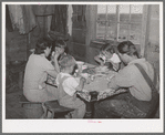 The Ray Halstead family eating dinner. They are FSA (Farm Security Administration) rehabilitation borrowers on Dead Ox Flat. Malheur County, Oregon. He rents his land