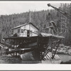 Dredging for gold and silver with doodle-bug. Baker County, Oregon