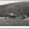 Dredging for gold and silver with doodle-bug. Baker County, Oregon