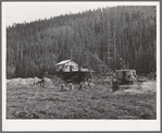 Dredging for gold and silver with doodle-bug. Baker County, Oregon