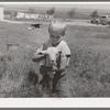 Son of Mr. Browning with his pet goat. Mr. Browning in a FSA (Farm Security Administration) rehabilitation borrower living at Dead Ox Flat, Malheur County, Oregon