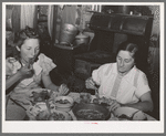 Mrs. Browning and her daughter eating dinner. This family does much canning in line with FSA (Farm Security Administration) live at home program. They are FSA rehabilitation borrowers at Dead Ox Flat, Malheur County, Oregon