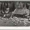 Bourne, Oregon. Crumbling buildings in a ghost mining town. The town came into existence in the 1870s and was notorious for the wildcat venture. Exodus from the camp occured in 1906 and most of the mines have remained closed. In the 1940 Oregon state