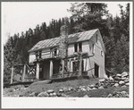 Abandoned house which was headquarters of wildcat mining organization in 1906. Bourne, Oregon