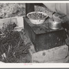 Cook stove in tent home of young farmer and his wife. Vale-Owyhee irrigation project, Malheur County, Oregon. This is first year on this land, in fact, they had been here only two months. This year they will devote time, energy, and money to getting their