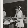 Schoolgirl demonstrating cooking methods at the 4-H Club Spring fair. Adrian, Oregon