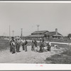 Playing during recess at the school at the FSA (Farm Security Administration) camp for farm workers. Caldewell, Idaho