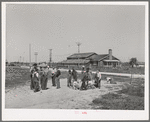 Playing during recess at the school at the FSA (Farm Security Administration) camp for farm workers. Caldewell, Idaho