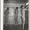 Showers at the FSA (Farm Security Administration) migratory labor camp mobile unit. Wilder, Idaho. There is no one thing that the migratory farm workers appreciate more at the camps, both permanent and mobile, than the hot water for bathing and laundry