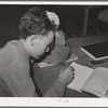 Schoolboy at the FSA (Farm Security Administration) farm workers' camp. Caldwell, Idaho