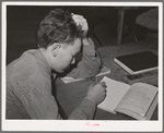 Schoolboy at the FSA (Farm Security Administration) farm workers' camp. Caldwell, Idaho
