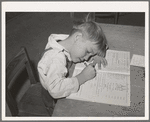 Schoolgirl at the FSA (Farm Security Administration) farm workers' camp. Caldwell, Idaho. Several family units of the row shelters have been thrown open to form a big room for the school