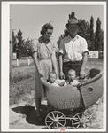 Farm worker with his wife and their twin babies at the FSA (Farm Security Administration) migratory labor camp mobile unit. Wilder, Idaho