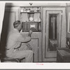 Construction worker in his trailer home. San Diego, California