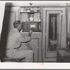Construction worker in his trailer home. San Diego, California
