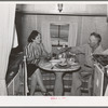 Construction worker of Kearney-Mesa and his wife have lunch in their trailer home. San Diego, California