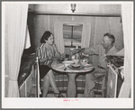 Construction worker of Kearney-Mesa and his wife have lunch in their trailer home. San Diego, California