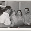 People requesting information and registering at the office of the FSA (Farm Security Administration) trailer camp for defense workers. San Diego, California