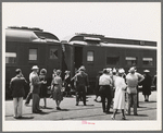 These four photographs were taken at the railroad station when a noon train came in. All trains coming into San Diego are crowded and are an indication of the hordes of people pouring into the city. California