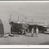 Crowded trailer court. This court has too many trailers for the space alloted them, sanitary facilities are inadequate. It will probably be condemned by the board of health. San Diego, California