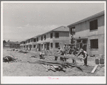 Houses under construction at the Navy defense housing project for enlisted men in the Marines and Navy. San Diego, California