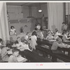 Second and third grades at the Balboa School, San Diego, attend classes held in the cafeteria of the school. San Diego, California