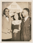 Lawrence Reddick with his wife Ruth and musician Jimmie Lunceford at a gathering for Fisk University