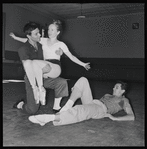 Frank Hobi with Janet Reed on his knee and Roy Tobias on the floor during rehearsal of Á La Française