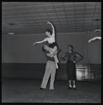 George Balanchine lifting Janet Reed with Andre Eglevsky during rehearsal of Á La Française