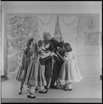 Michael Arshansky as Drosselmeyer and children in The Nutcracker