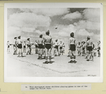 This photograph show children playing games in one of the camps for Polish boys.