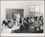 Instructor and class at the vocational school for aircraft construction workers. San Diego, California