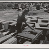 Making irrigation tile. Canyon County, Idaho. Practically all agriculture depends upon irrigation in this county