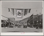 Main street of Vale, Oregon, on the Fourth of July. Vale is one of the shopping centers for the farmers who live and work on the Vale-Owyhee irrigation project