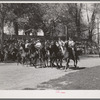 Starting line of the kids' horse race at the Fourth of July celebration. Vale, Oregon. This was a farm boys race. "No ringers, no professionals allowed" was the rule