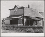 Old bank building now used as residence. Cascade, Idaho. The town moved from its old location to the highway about a mile west