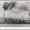 Lumber mill at Cascade, Idaho. There are about 300 lumber mills in Idaho, but 93% of the lumber is sawed by twenty-seven of these mills