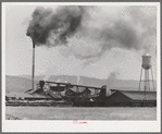 Lumber mill at Cascade, Idaho. There are about 300 lumber mills in Idaho, but 93% of the lumber is sawed by twenty-seven of these mills