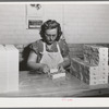 Wrapping quarter pounds of butter at the Dairymen's Cooperative Creamery. Caldwell, Canyon County, Idaho. During 1940, 4,000,000 pounds of butterfat were received by the cooperative