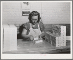 Wrapping quarter pounds of butter at the Dairymen's Cooperative Creamery. Caldwell, Canyon County, Idaho. During 1940, 4,000,000 pounds of butterfat were received by the cooperative