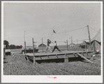 Boxing platform at FSA (Farm Security Administration) migratory farm labor camp mobile unit. Athena, Oregon