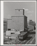 Adding new storage space to wheat elevator at Dayton, Washington. They were getting ready for a bumper crop